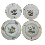 Four 19th century bird decorated porcelain plates