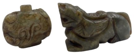 Carved green stone model of Bixix