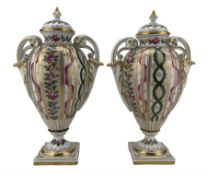 Pair of early 20th century Dresden vases with covers