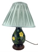 Moorcroft Buttercup pattern table lamp with pleated shade on wooden base H21cm excluding fittings