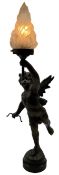 Late Victorian spelter figural lamp in the form of a winged cherub with glass shade