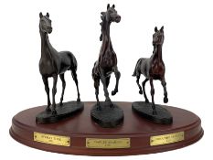 Set of three Franklin Mint bronze model horses