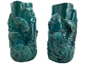 Pair of Chinese turquoise glazed pottery vases decorated with a raised pattern of carp H25cm