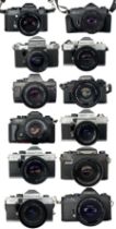 Twelve vintage cameras