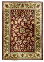 Large Persian design red ground rug