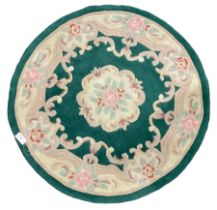 Circular Chinese design turquoise ground rug