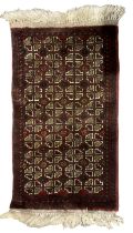 Persian Baluchi burgundy ground prayer rug