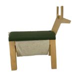 Plywood footstool in the form of a deer with upholstered seat