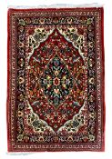 Persian Qum crimson ground rug