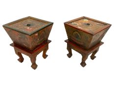 Pair of painted Chinese lidded boxes on stands