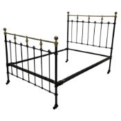 Victorian black painted wrought metal and brass 4'6" double bedstead
