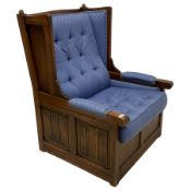 Mid-20th century oak framed wingback Monk's armchair