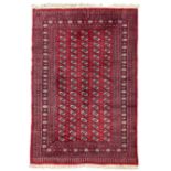 Persian Bokhara red ground rug