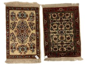 Persian ivory ground rug