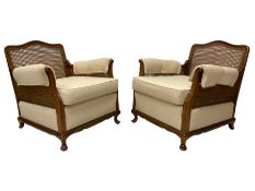Pair of mahogany framed bergère armchairs