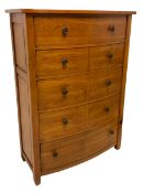 Oak and pine finish bow-front six-drawer chest