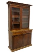 Early Victorian mahogany bookcase on cupboard