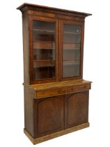 Early Victorian mahogany bookcase on cupboard