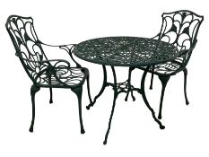 Nova Garden Furniture - green finish cast metal garden table with circular top and a pair of garden