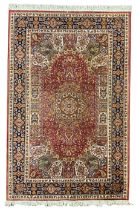 Persian design red ground rug