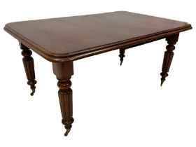 Early Victorian mahogany dining table