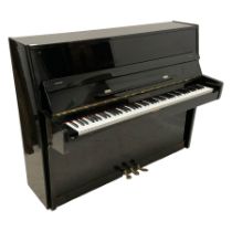 Steinhoff - compact black lacquered upright piano