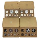Four Cook Island proof eight coin sets