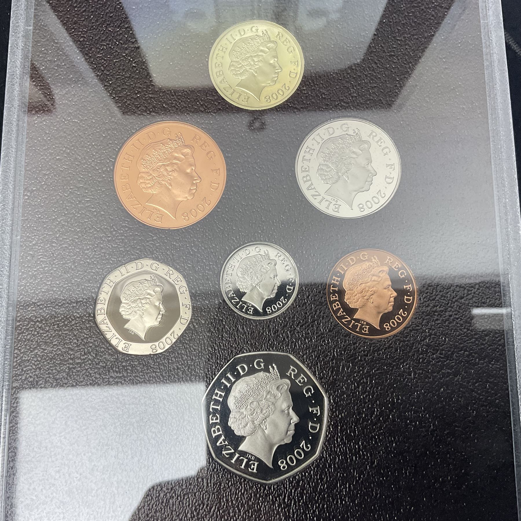 The Royal Mint United Kingdom 1972 - 1982 'The Queen Elizabeth II Collection' comprising four sterli - Image 3 of 9