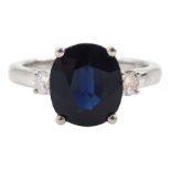 18ct white gold three stone oval mix cut sapphire and round brilliant cut diamond ring