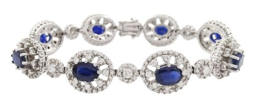 18ct white gold oval cut sapphire and round brilliant cut diamond bracelet