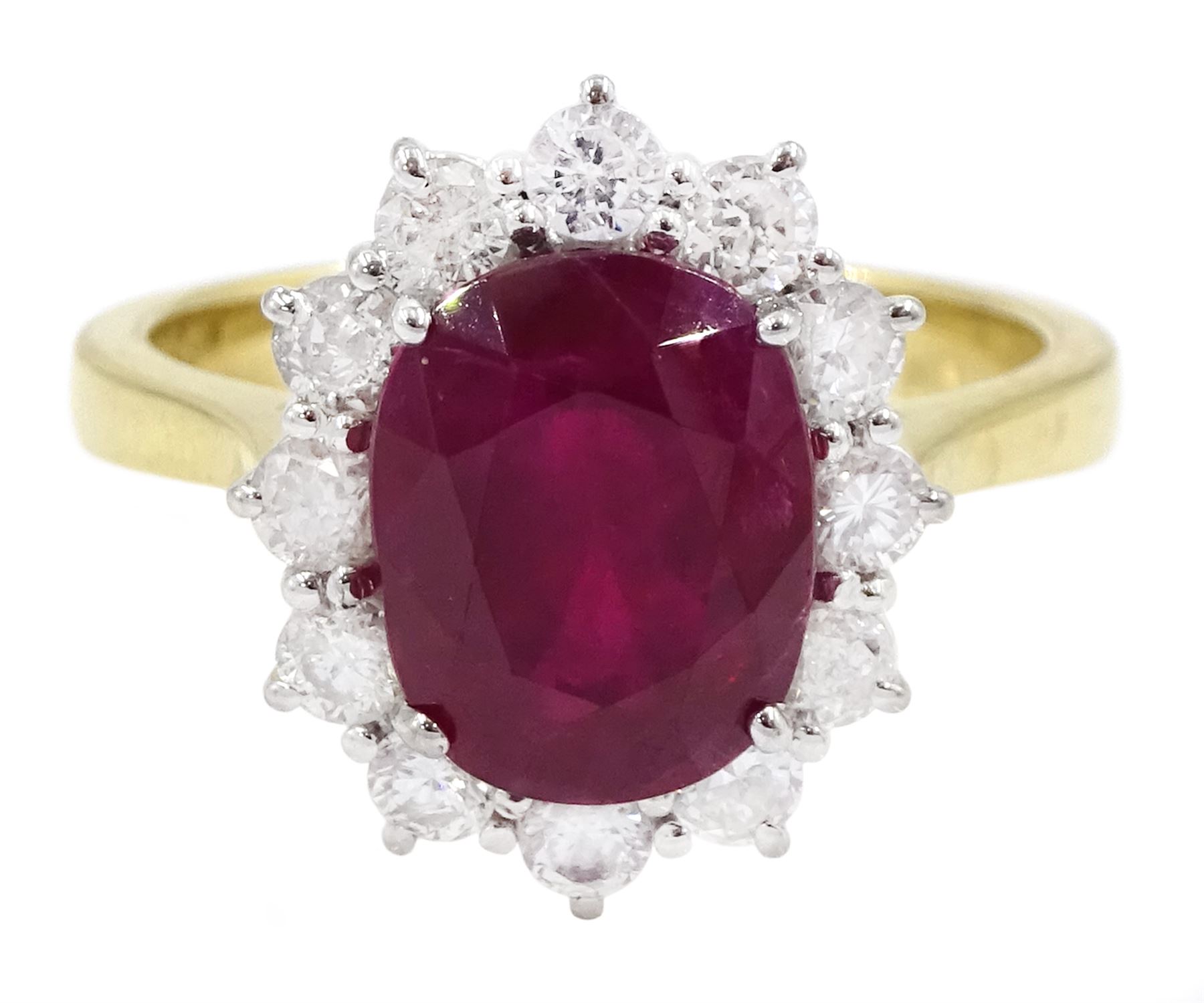 18ct gold oval cut ruby and round brilliant cut diamond cluster ring