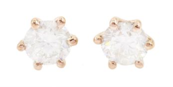 Pair of 18ct rose gold round brilliant cut diamond stud earrings