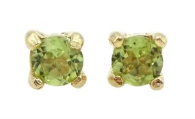 Pair of 9ct gold peridot stud earrings