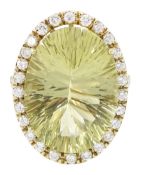 18ct gold oval cut lemon quartz and round brilliant cut diamond cluster ring