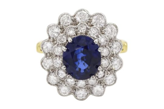 18ct gold oval cut sapphire and two row round brilliant cut diamond cluster ring - Image 1 of 4