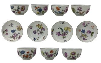 Set of seven 18th century Meissen tea bowls with four saucers