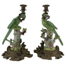 Pair of 20th century porcelain and brass mounted candlesticks