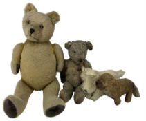 Mid-20th century soft toys including teddy bears