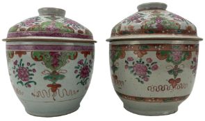 Pair of 19th century Chinese famille rose bowls and covers
