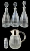 Three Strombergshyttan Swedish glass decanters with disc stoppers
