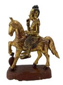 Large Burmese carved 'Nat' figure on horseback