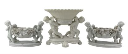 Pair of Victorian white glazed porcelain centrepieces