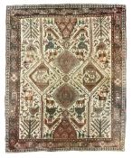 Antique Iranian ivory ground rug