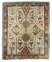 Antique Iranian ivory ground rug