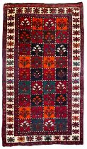 Persian Shiraz crimson ground garden rug