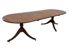 Regency design mahogany twin pedestal extending dining table