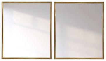 Pair of large gilt framed rectangular mirrors