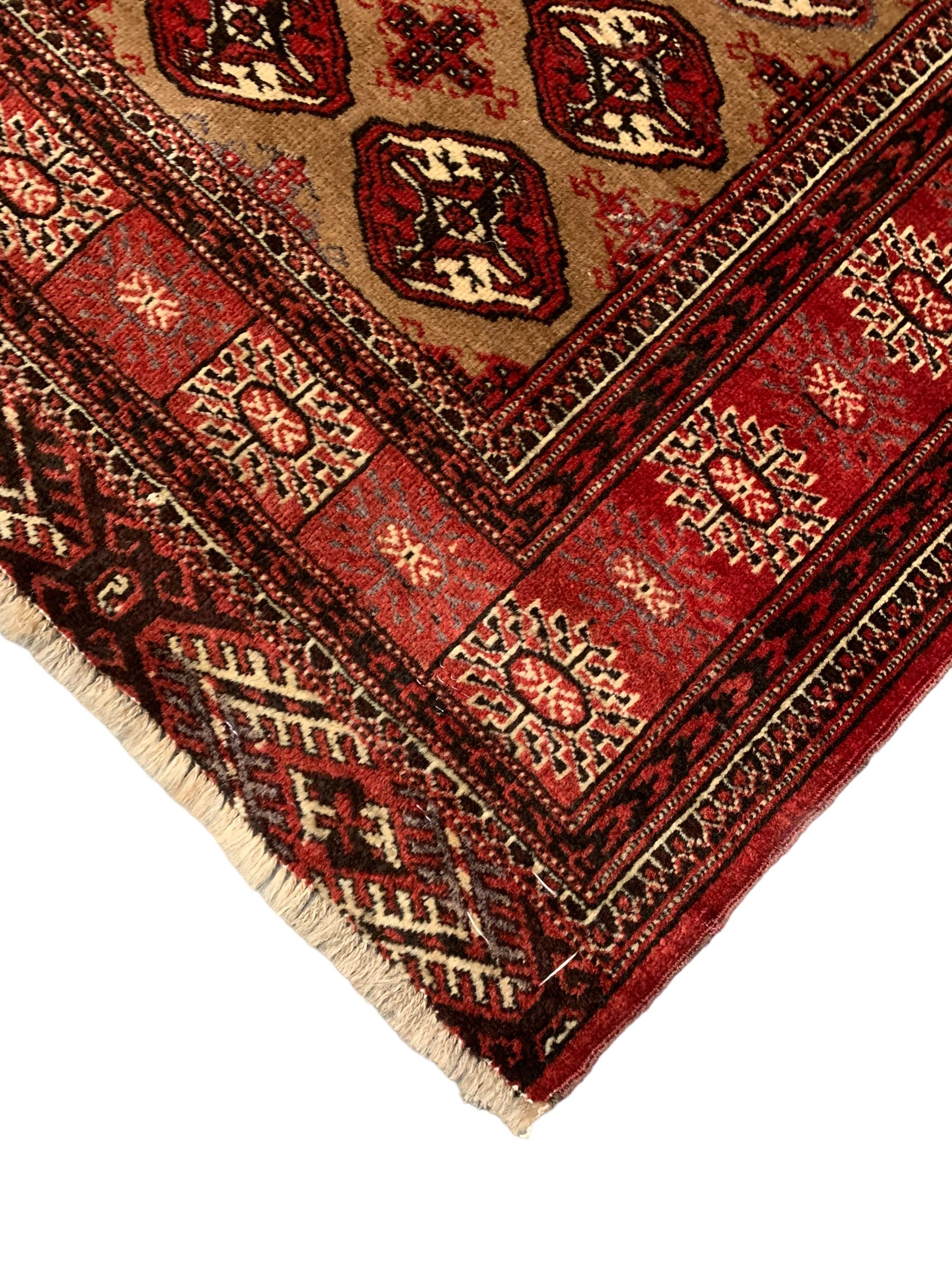 Persian Bokhara red ground rug - Image 2 of 6