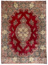 Persian Kerman crimson ground carpet