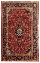 Small Persian Kashan crimson ground rug